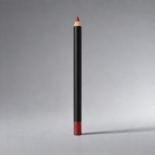 BaszCosmetics Razor Sharp Lip Pencil in Brick Boss on a soft gray studio background