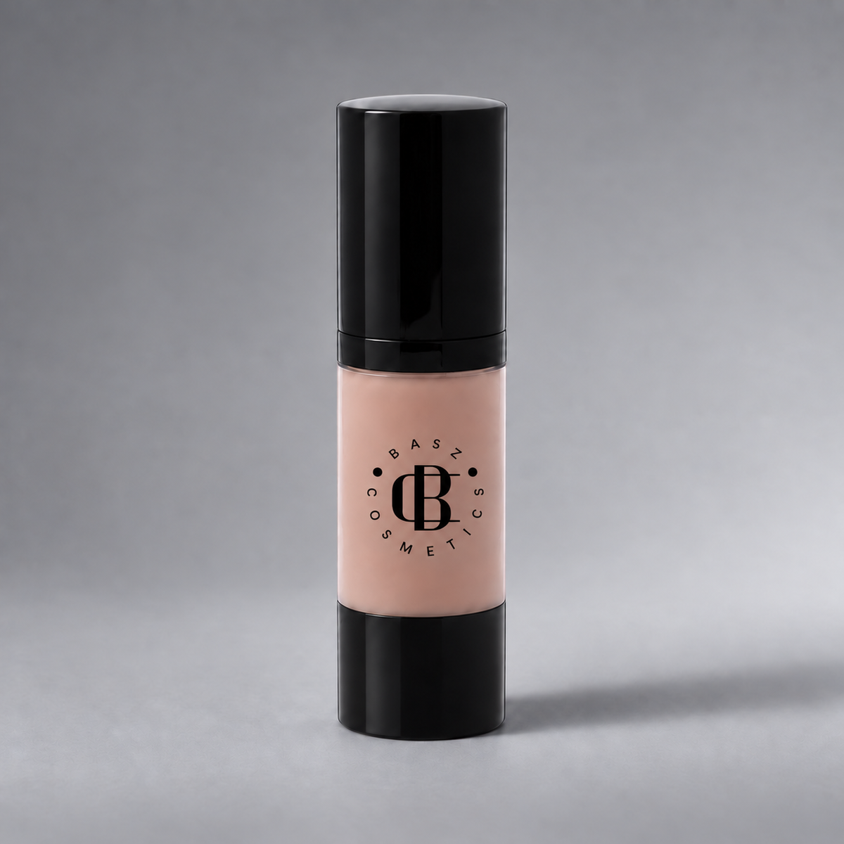 BaszCosmetics Bare It All Liquid Foundation — Porcelain Power (102), black logo on gray studio background