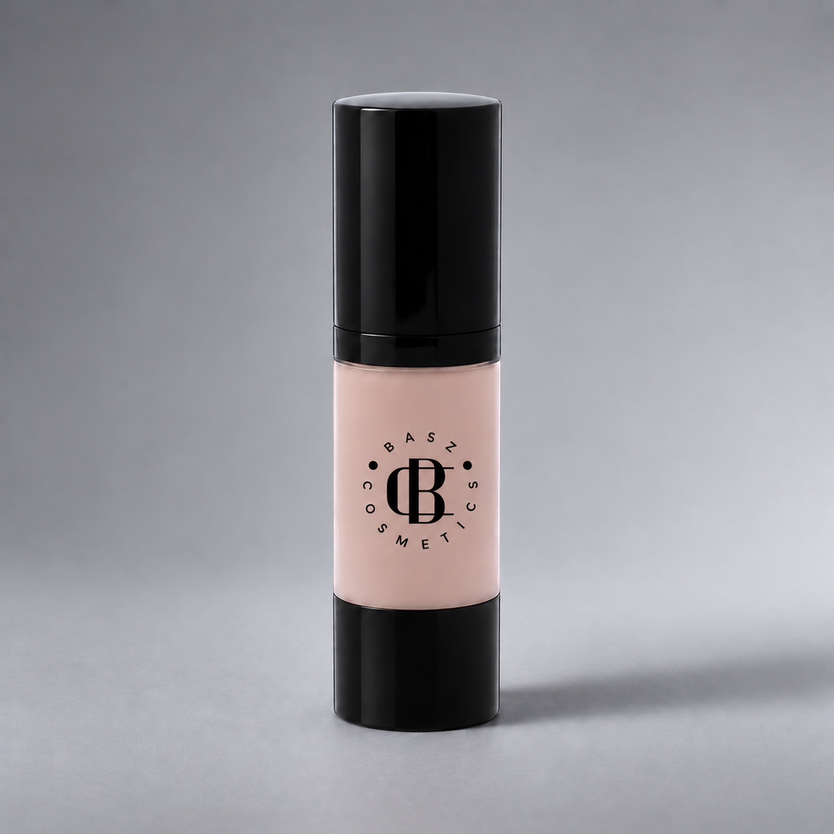 BaszCosmetics Bare It All Liquid Foundation — Nude Muse (111), black logo on gray studio background