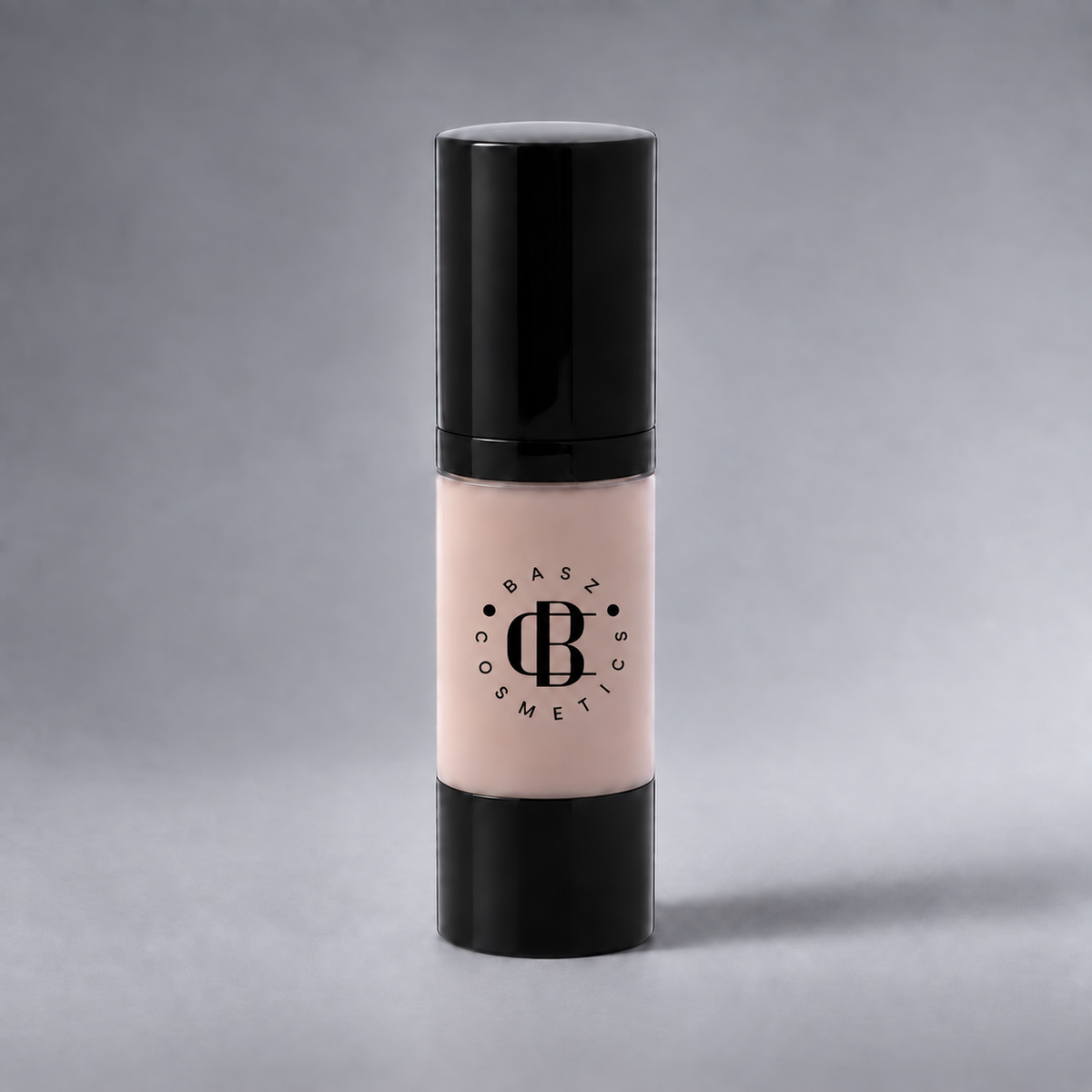 BaszCosmetics Bare It All Liquid Foundation — Ivory Whisper (150), black logo on gray studio background