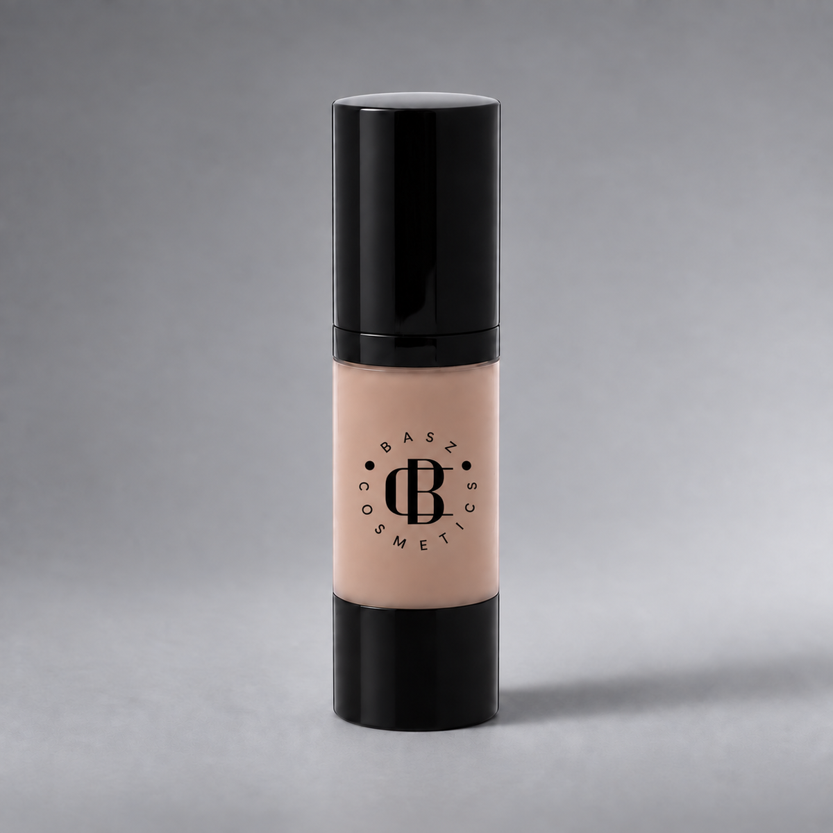 BaszCosmetics Bare It All Liquid Foundation — Ivory Icon (151), black logo on gray studio background