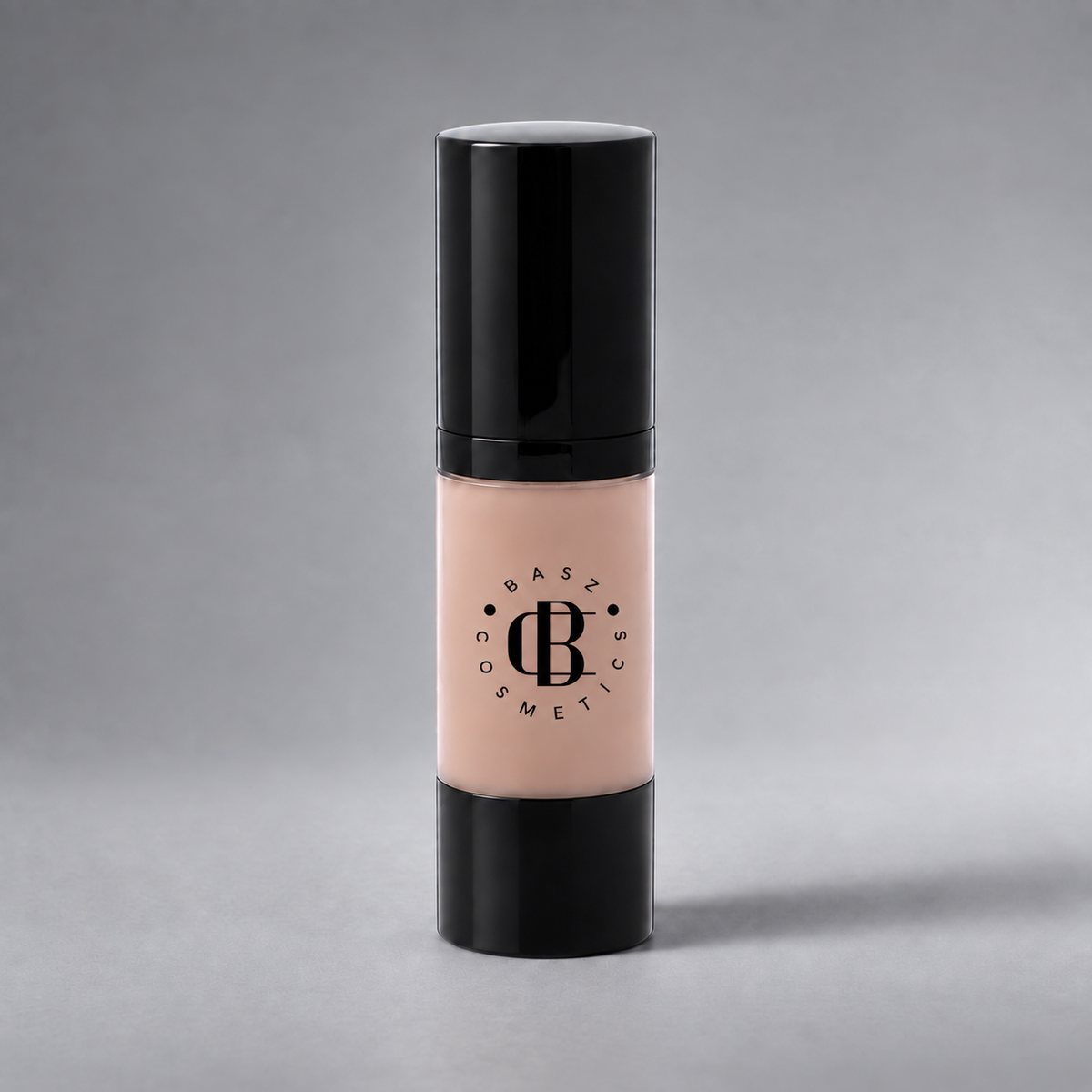 BaszCosmetics Bare It All Liquid Foundation — Ivory Attitude (152), black logo on gray studio background