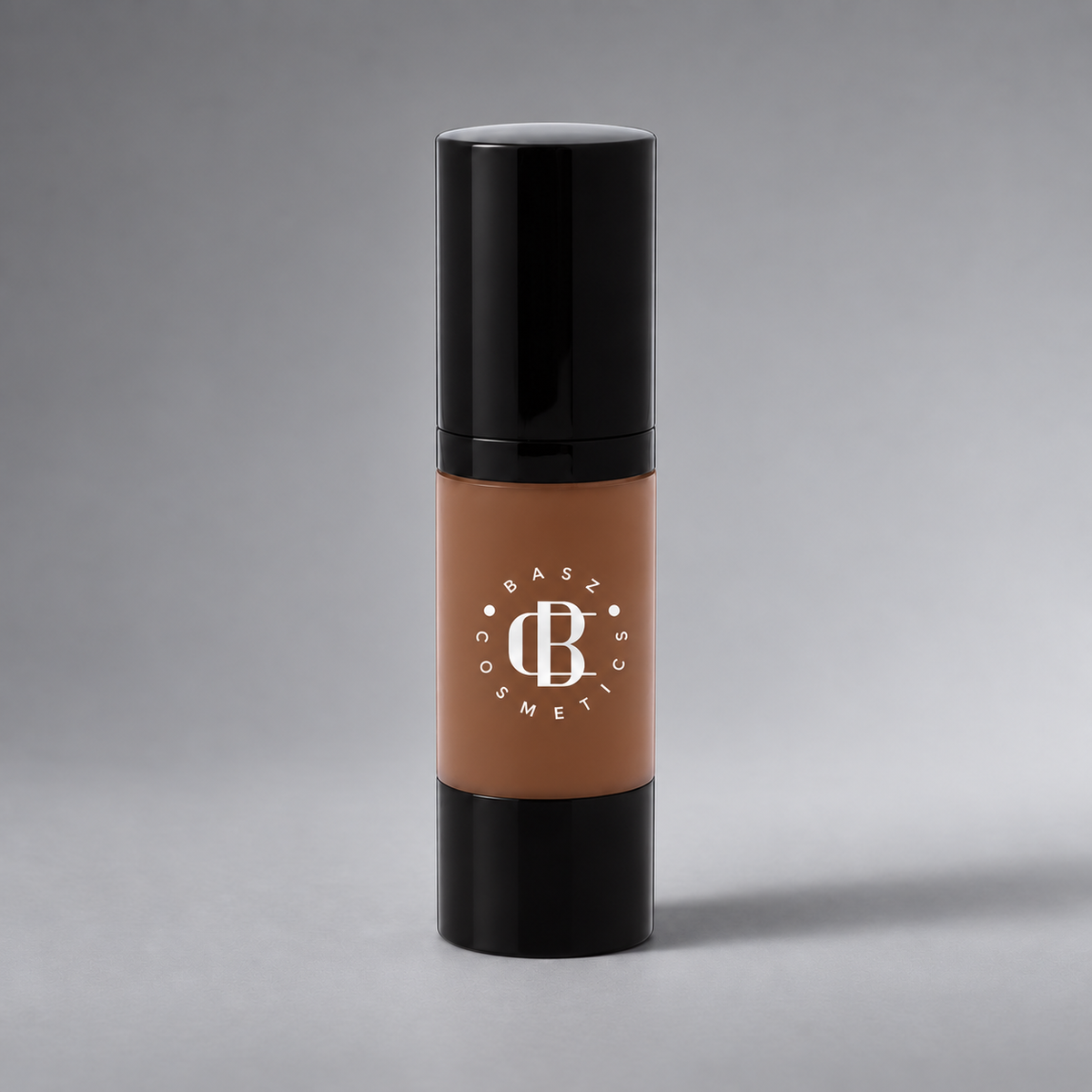 BaszCosmetics Bare It All Liquid Foundation — Toasted Espresso (158), white logo on gray studio background