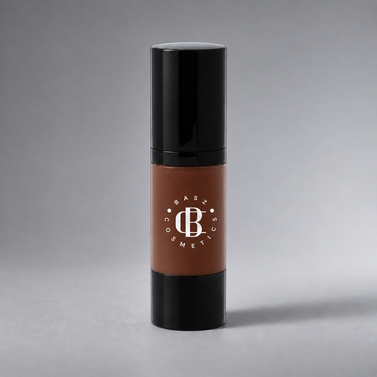 BaszCosmetics Bare It All Liquid Foundation — Sable Seduction (159), white logo on gray studio background