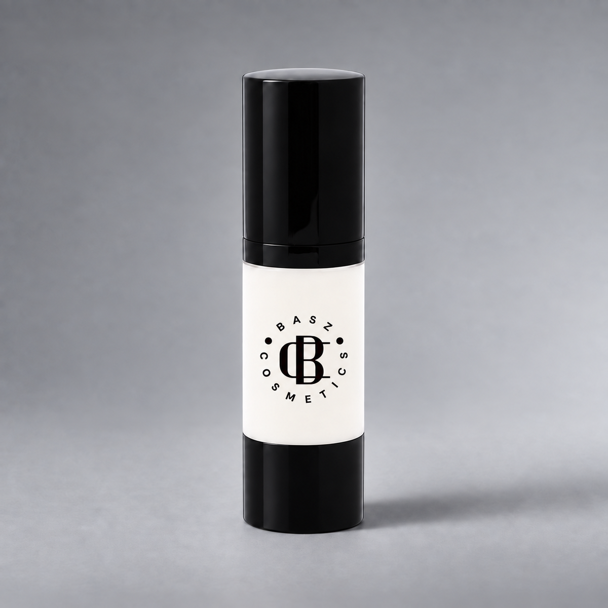 BaszCosmetics Bare It All Liquid Foundation — Mix It Light — White Adjuster (W), black logo on gray studio background